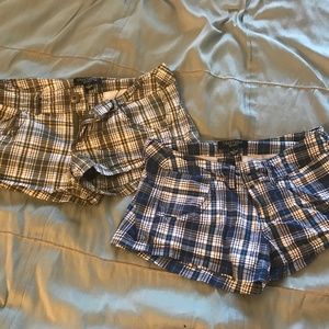 2 pairs of plaid size 1 shorts